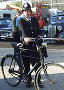 Policeman with bicycle
