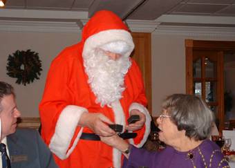Father Christmas distributes gifts